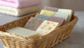 End of Batch - assorted handmade soap bars in a wicker basket